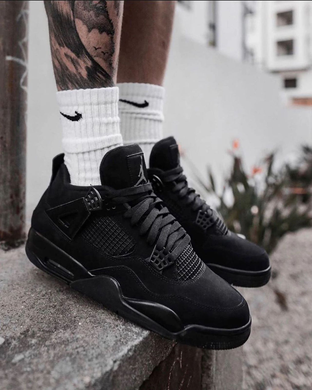 **Air Jordan 4 “Black Cat”**